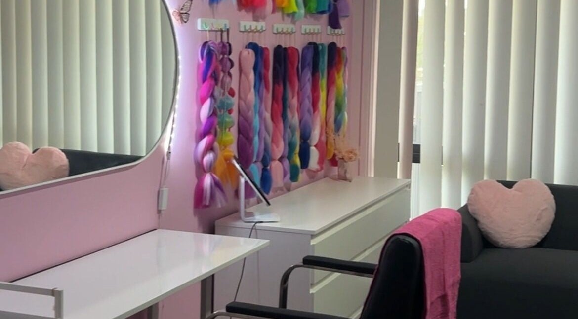 Vibrant braid wall and cozy decor at MAD'S BEAUTY BAR, Gregory Hills, New South Wales, AU.