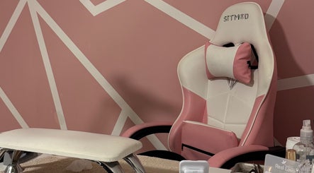 Stylish pink chair in Larissa Albernaz, Gort, County Galway, IE, perfect for beauty treatments.