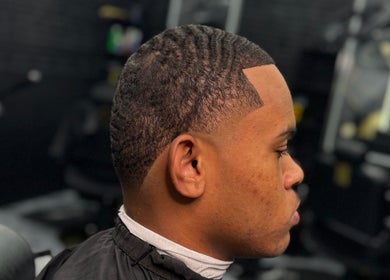 Sharp hairstyle at Milez Cutz, Nassau, New Providence, BS shows expert grooming.