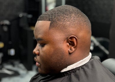 Close-up of a stylish haircut at Milez Cutz, Nassau, New Providence, BS, showcasing precision and style.
