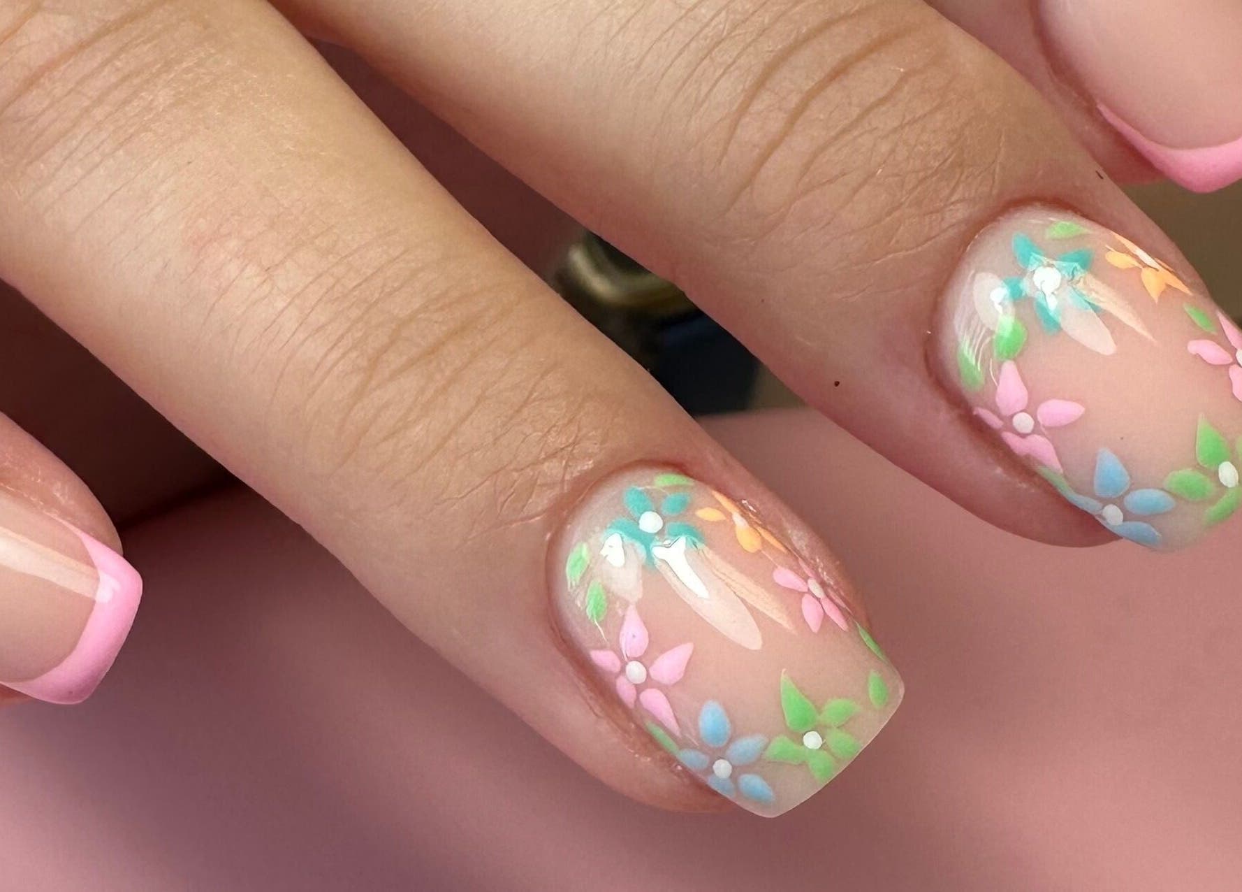 Elegant floral nail art at The Quiet Space, Thorold, Ontario, CA featuring pastel flower designs.