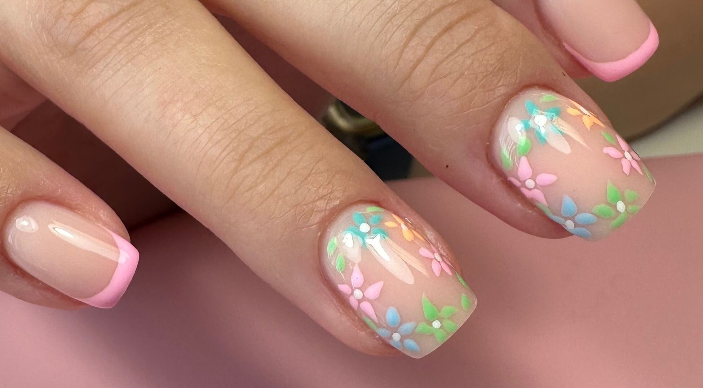 Elegant floral nail art at The Quiet Space, Thorold, Ontario, CA featuring pastel flower designs.