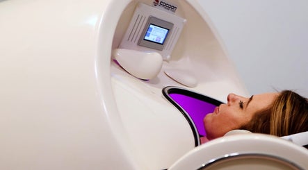 Relaxing in an infrared pod at Inside Out Infrared Wellness - Cairns, Aeroglen, Queensland, AU.