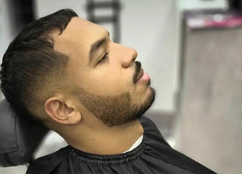Close-up of a man's stylish haircut at Barber Bro Gents Salon, Dubai, AE.