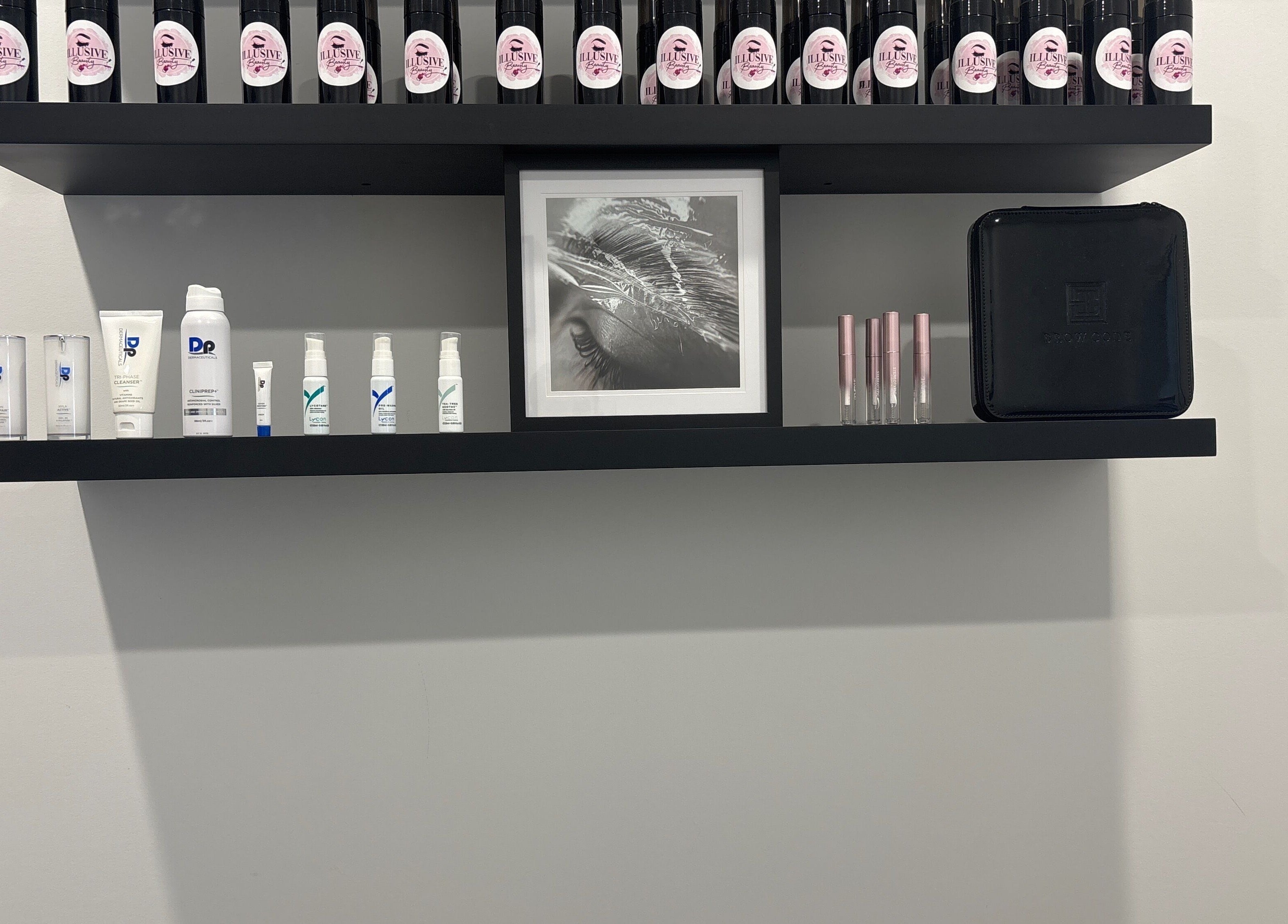 Skincare products on sleek shelves at Illusive Beauty, Nirimba, Queensland, AU.
