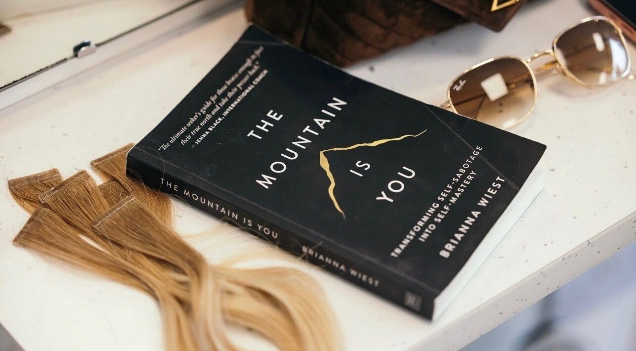 Trendy salon setup at Michelle Mallon Hair and Beauty, Newry, Northern Ireland, GB with book and extensions.