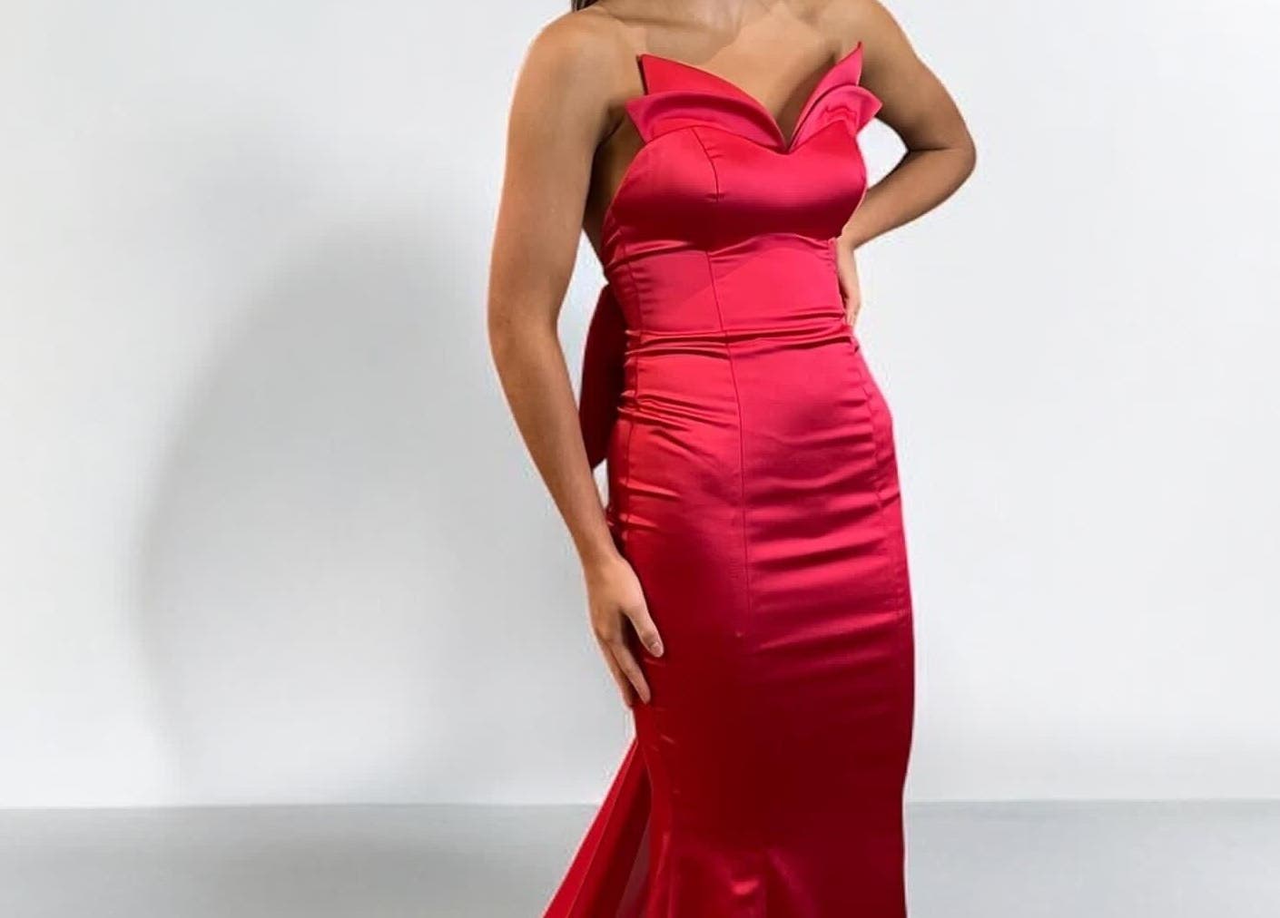 Woman in a red gown at Dressed to Impress, Newry, Northern Ireland, GB.