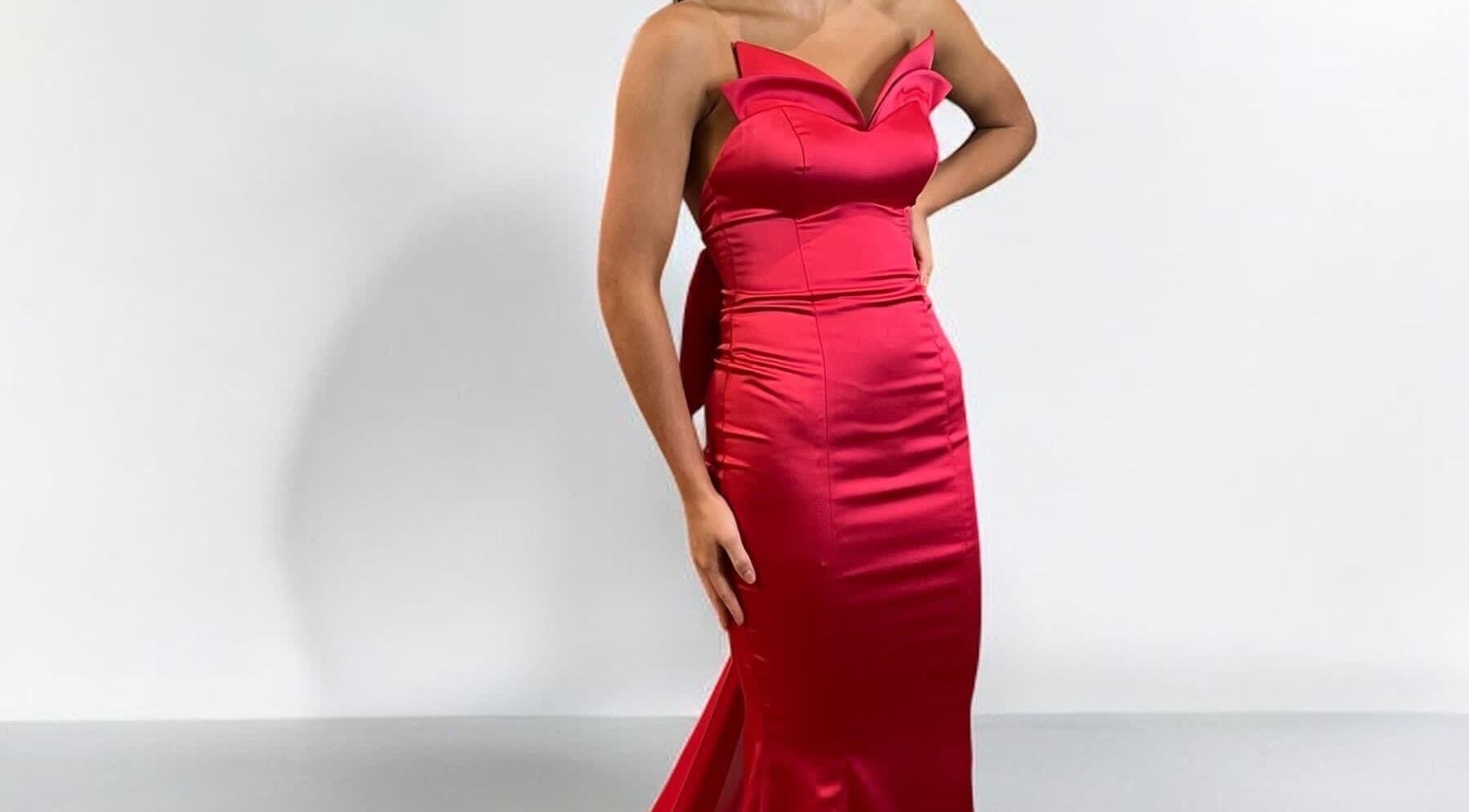 Woman in a red gown at Dressed to Impress, Newry, Northern Ireland, GB.