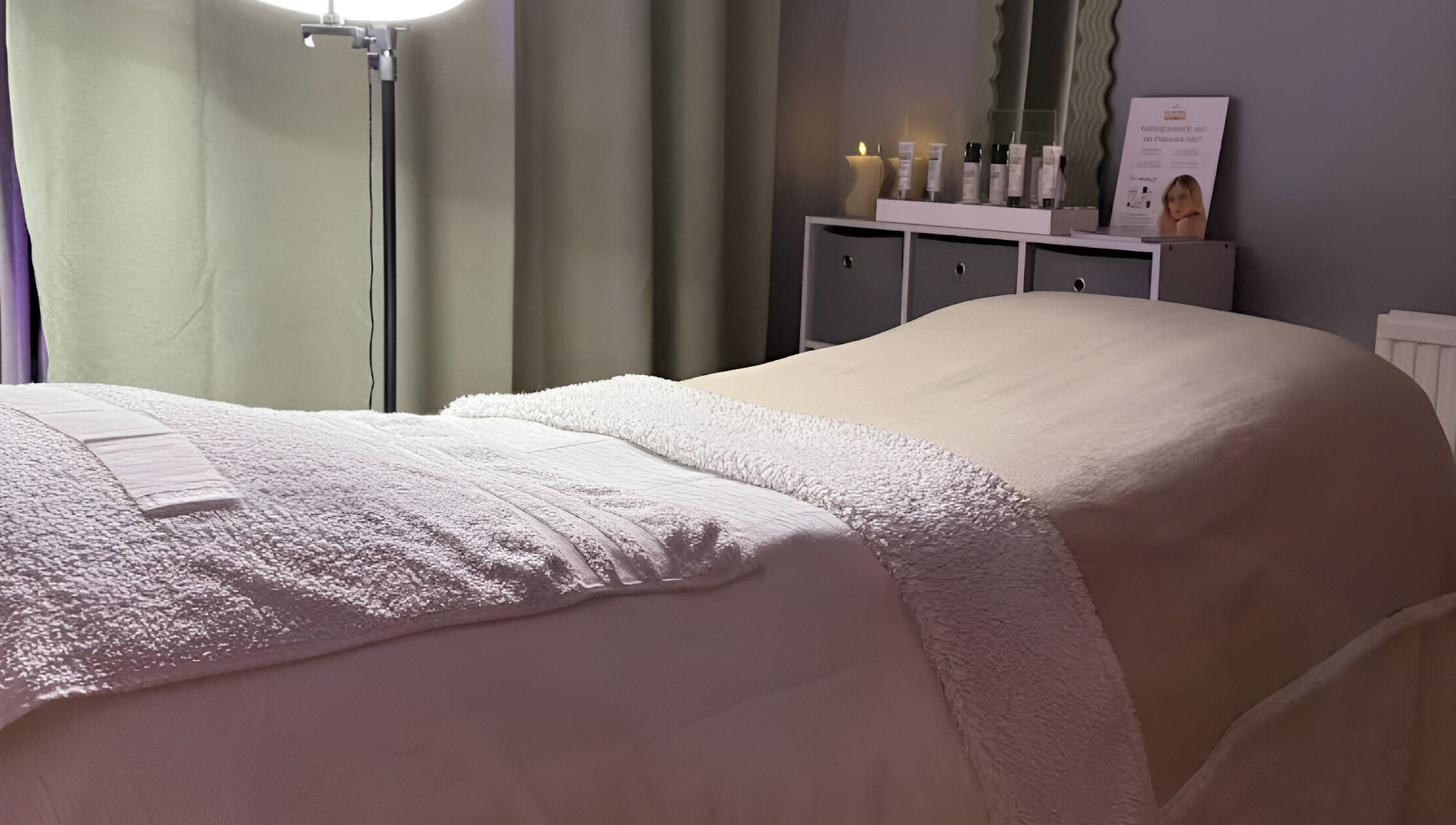 Relaxing spa bed setup at After Glow by Liv in Worsley, England, GB with cozy lighting and soothing ambiance.