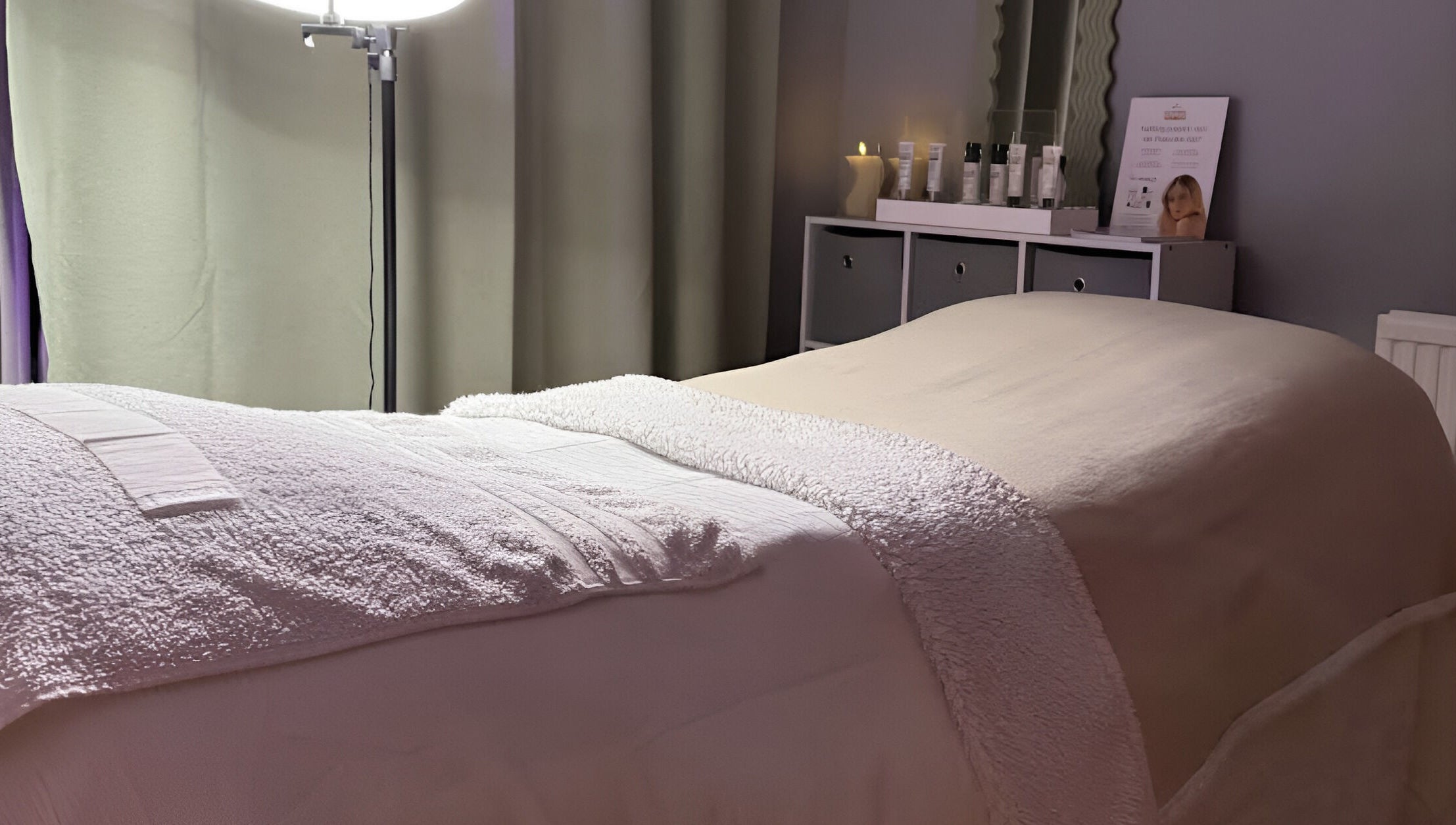 Relaxing spa bed setup at After Glow by Liv in Worsley, England, GB with cozy lighting and soothing ambiance.