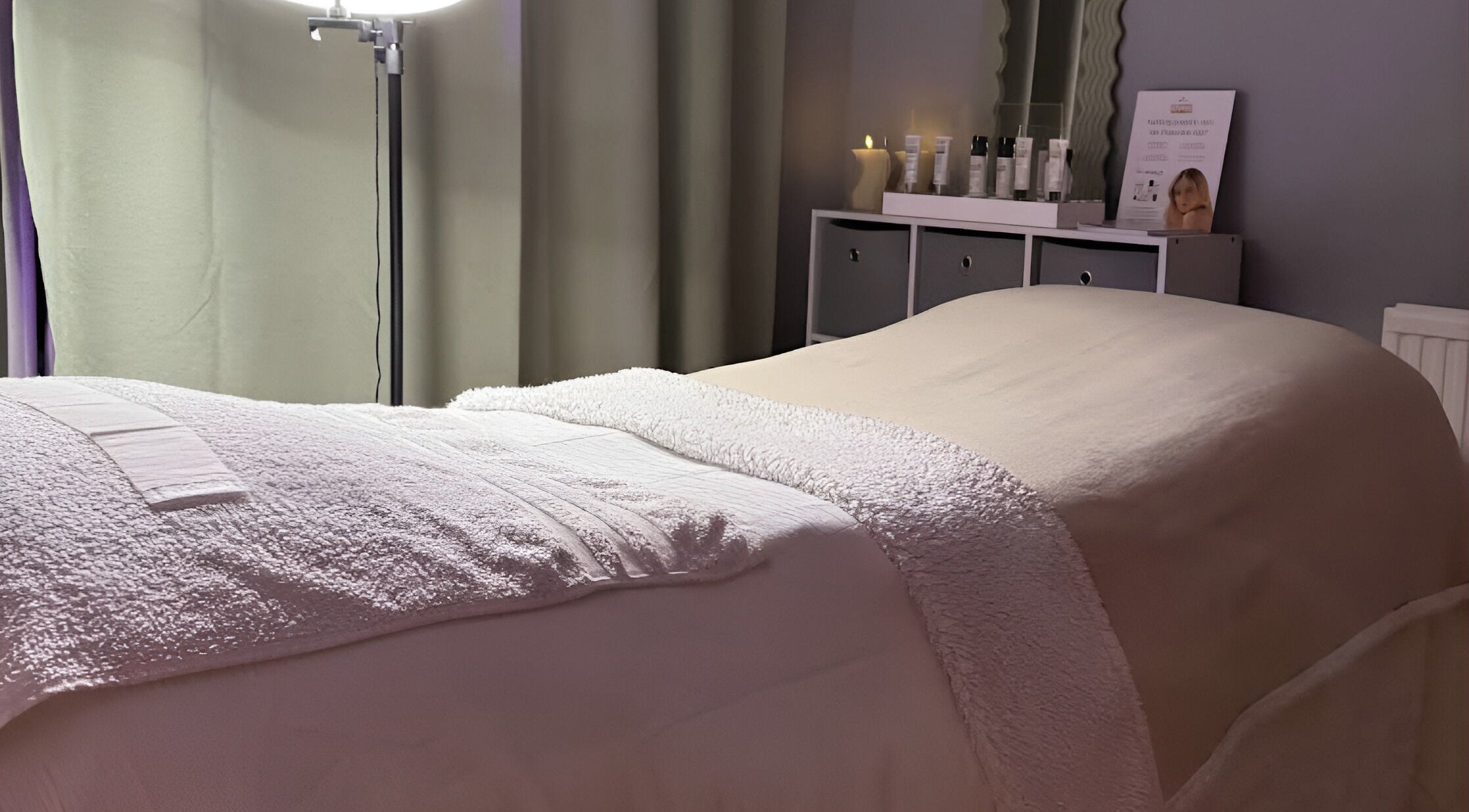 Relaxing spa bed setup at After Glow by Liv in Worsley, England, GB with cozy lighting and soothing ambiance.