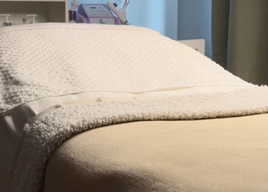 Relaxing treatment bed at After Glow by Liv, Worsley, England, GB offers ultimate comfort.