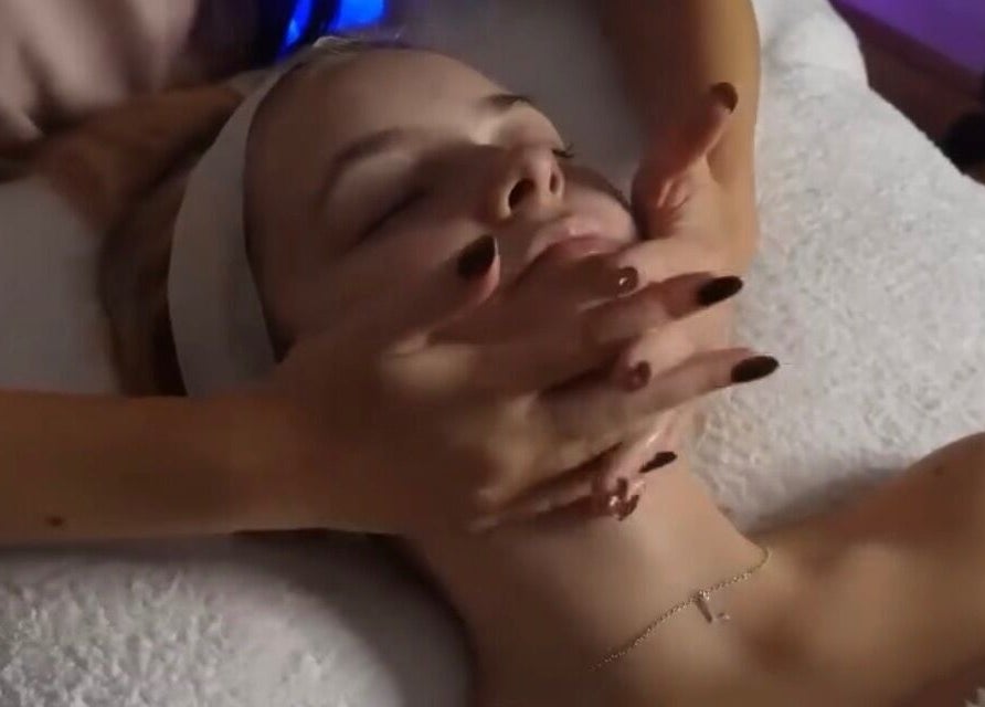 Relaxing facial treatment at After Glow by Liv, Worsley, England, GB, enhances skin rejuvenation and peace.