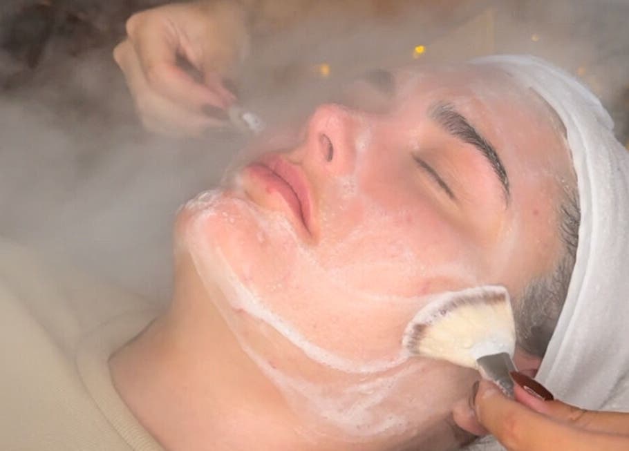 Facial treatment at After Glow by Liv, Worsley, England, GB. Face covered in foam during a serene spa session.