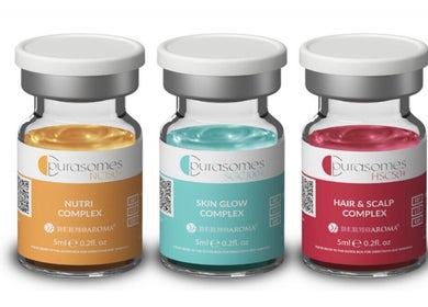 Three skincare vials at Skintap, London, England, GB, showcasing Nutri Complex, Skin Glow, and Hair & Scalp.