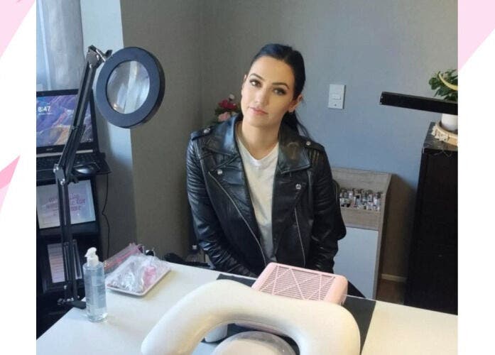 Friendly nail artist at Clawed Nail Studio, Pukekohe, Waikato, NZ, ready for a manicure session.