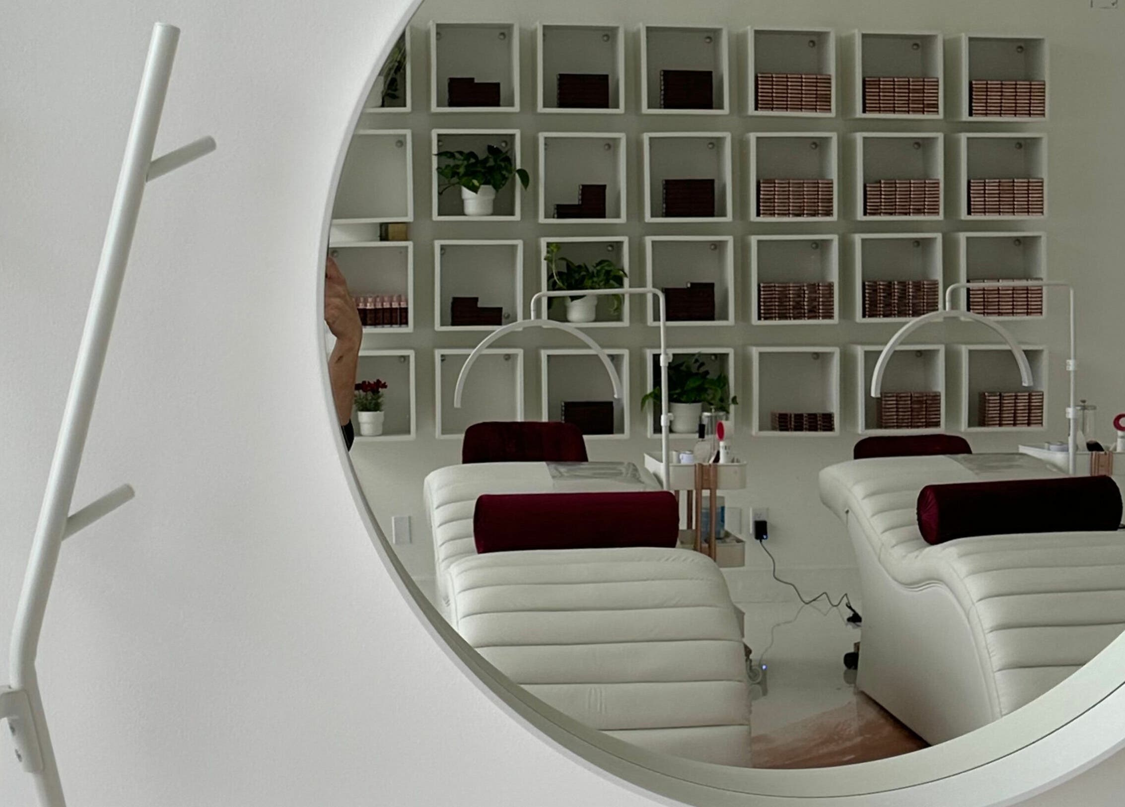 Reflection in a mirror of a stylish treatment room at Bordo Lash Lounge and Academy Ltd., Maple Ridge, British Columbia, CA.