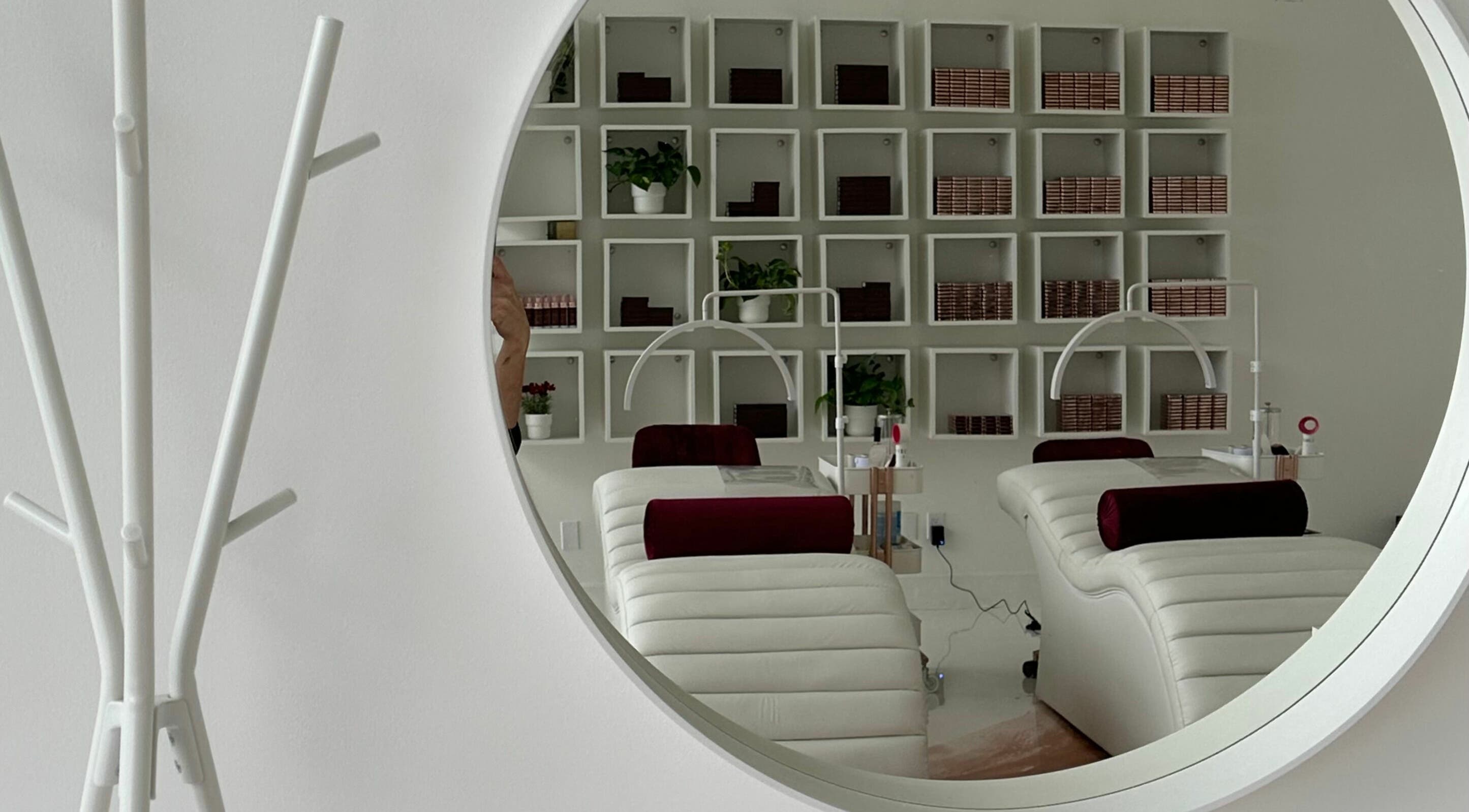 Reflection in a mirror of a stylish treatment room at Bordo Lash Lounge and Academy Ltd., Maple Ridge, British Columbia, CA.