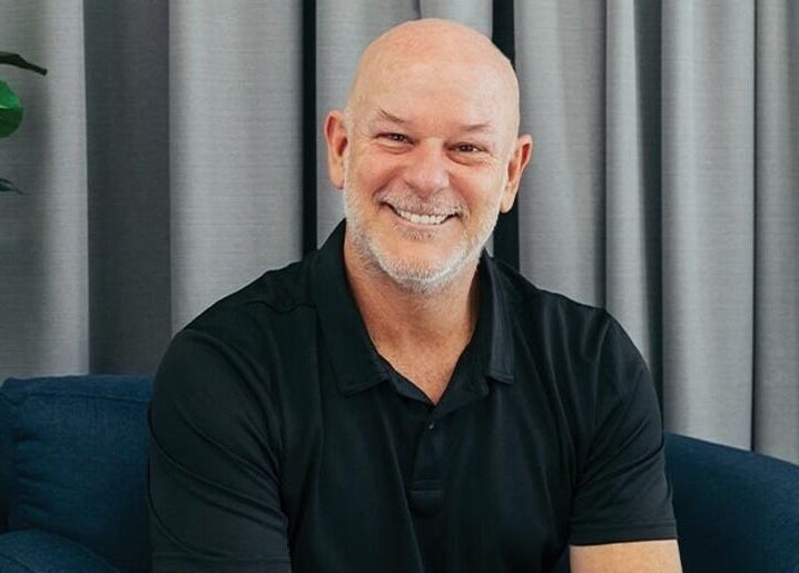 Smiling individual at Hyperbaric O2 Health, Bowen Hills, Queensland, AU, enhancing the welcoming atmosphere.