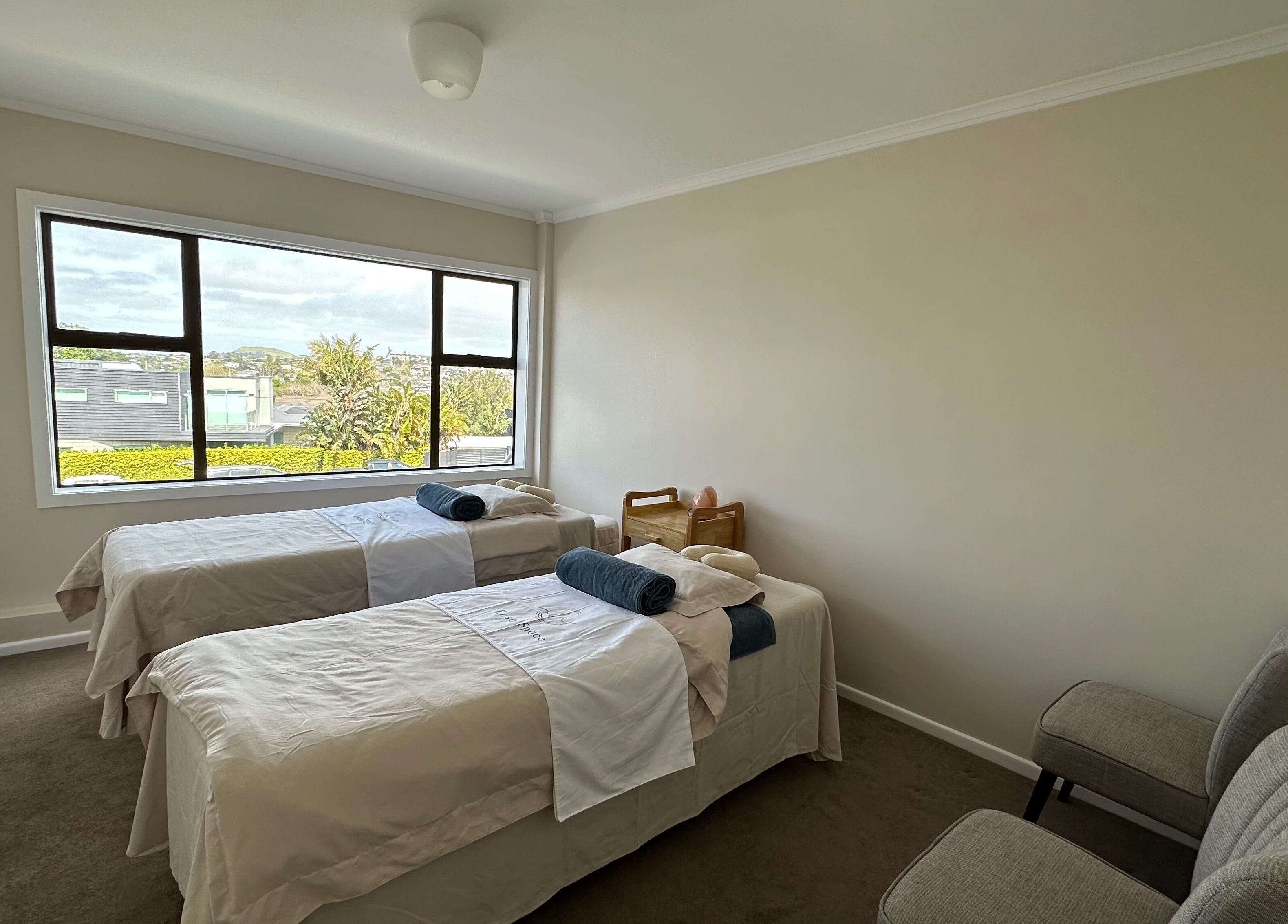 Peaceful massage room with two beds at Enso Space - Massage, Beauty, Tea, Connection in Auckland, Auckland, NZ.