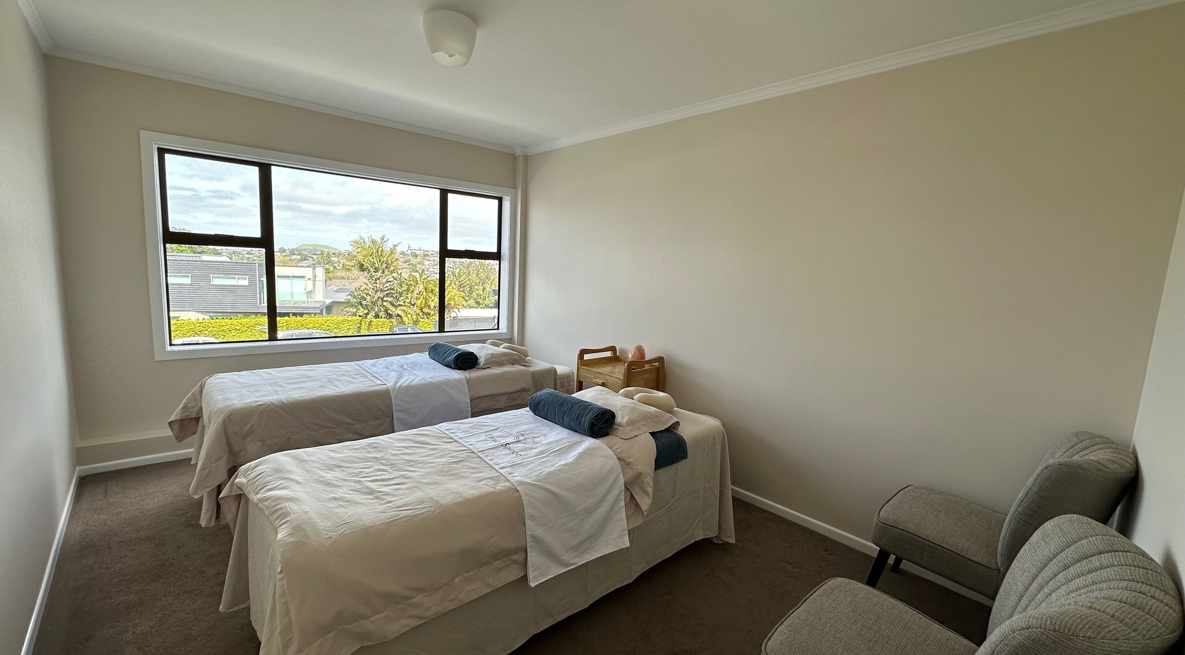 Peaceful massage room with two beds at Enso Space - Massage, Beauty, Tea, Connection in Auckland, Auckland, NZ.