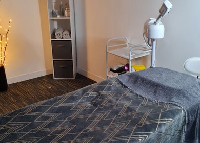 Tranquil spa treatment room at FAB, Norwich, England, GB with relaxing ambiance and modern equipment.