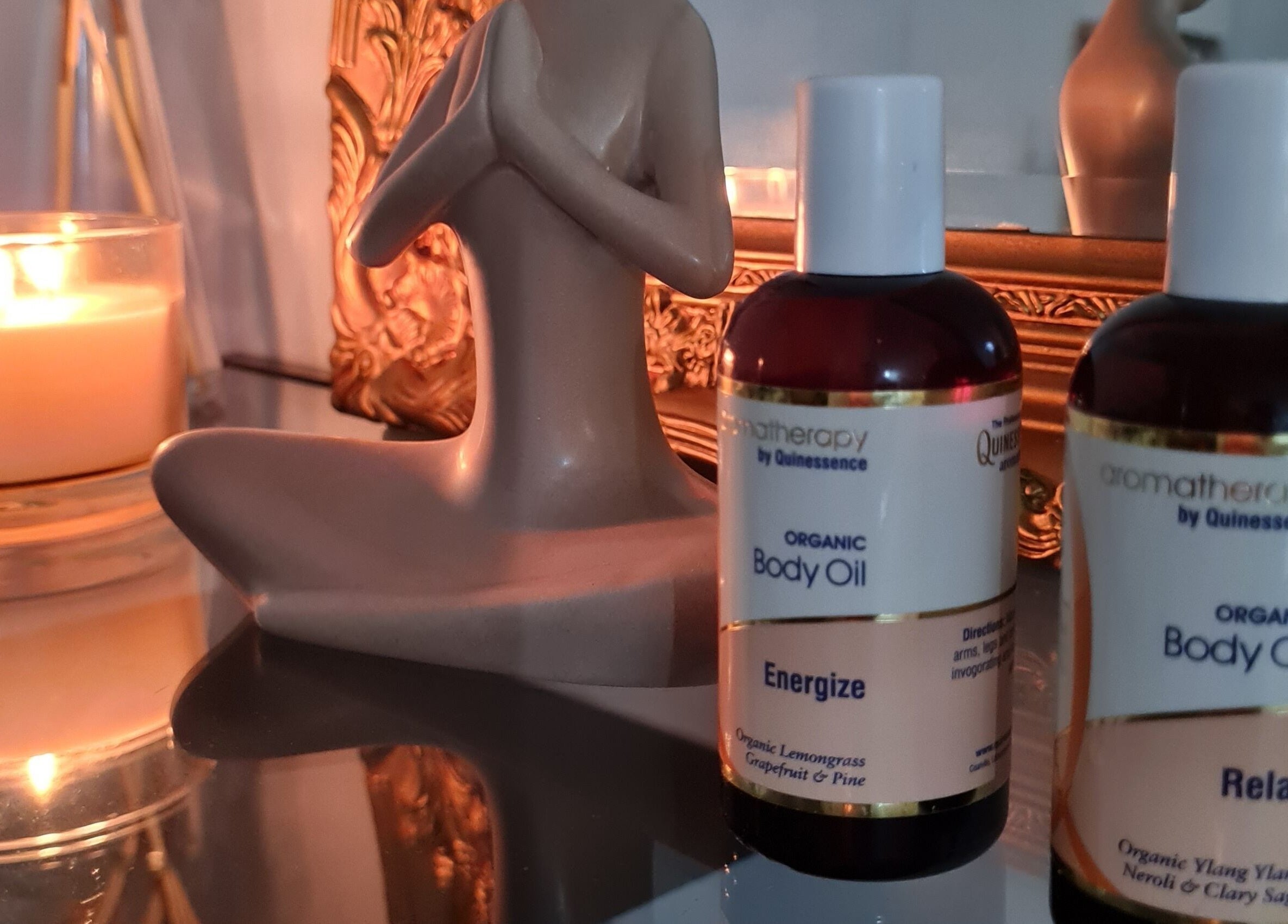 Calming body oils and candle at FAB, Norwich, England, GB enhance relaxation and wellness.