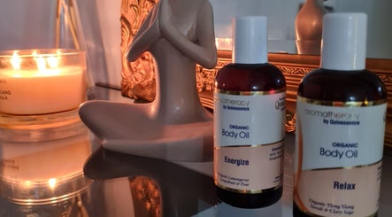 Calming body oils and candle at FAB, Norwich, England, GB enhance relaxation and wellness.