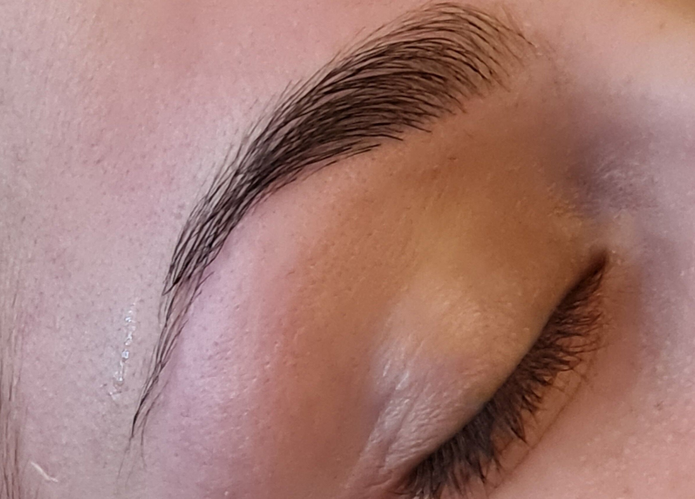 Expertly shaped eyebrow treatment at FAB, Norwich, England, GB, highlighting precision and style.