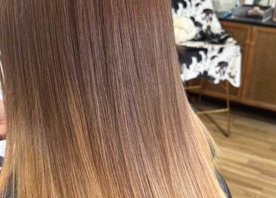 Glossy, straight hair styled at Ethereal Beauty Lounge, Peterborough, England, GB.