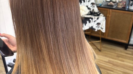 Glossy, straight hair styled at Ethereal Beauty Lounge, Peterborough, England, GB.
