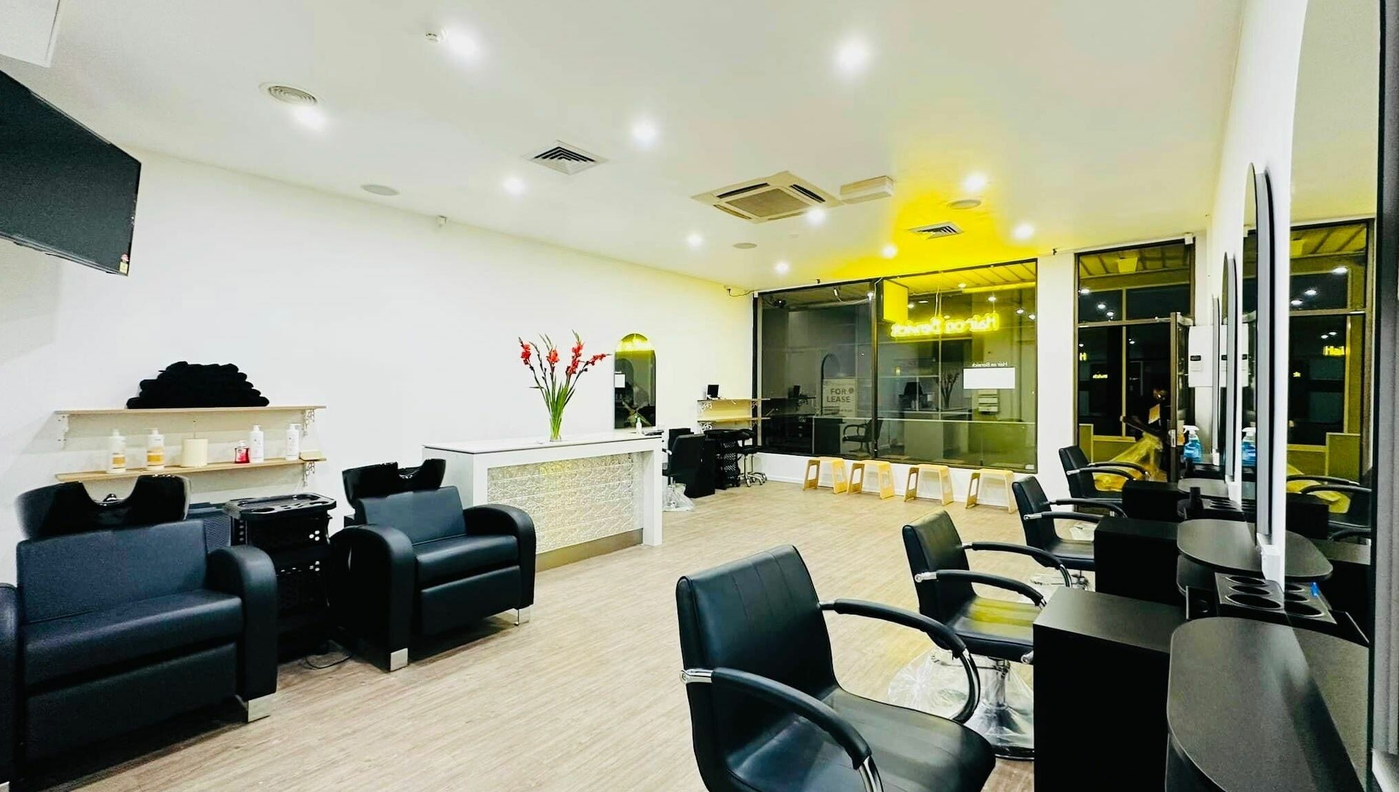 Modern salon interior at Hair On Berwick, Casey, Victoria, AU with sleek chairs and stylish décor.