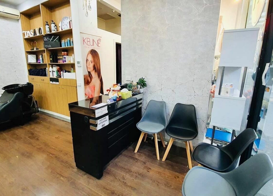 Modern salon interior at Hair On Berwick in Casey, Victoria, AU showcasing stylish seating and hair stations.