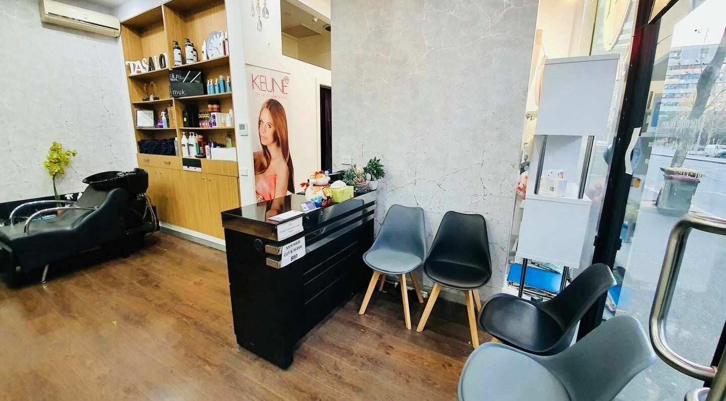 Modern salon interior at Hair On Berwick in Casey, Victoria, AU showcasing stylish seating and hair stations.