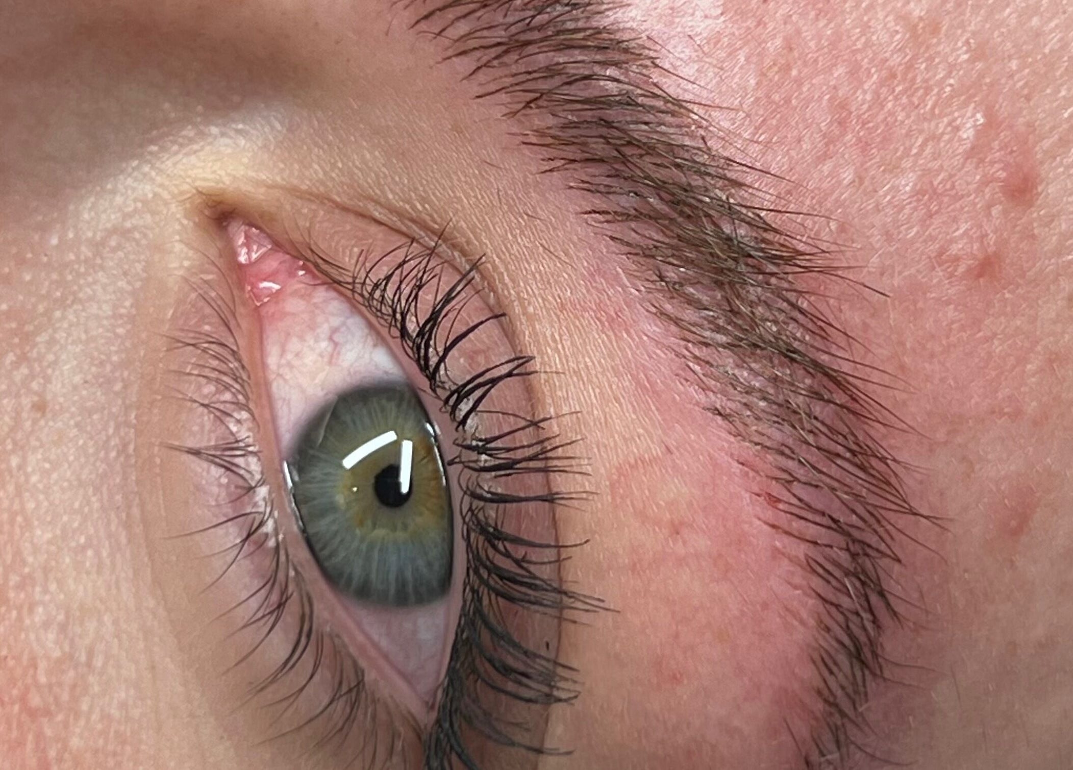 Close-up of expertly shaped eyebrow and eyelashes at Yuna Uchoa, Dublin, County Dublin, IE.