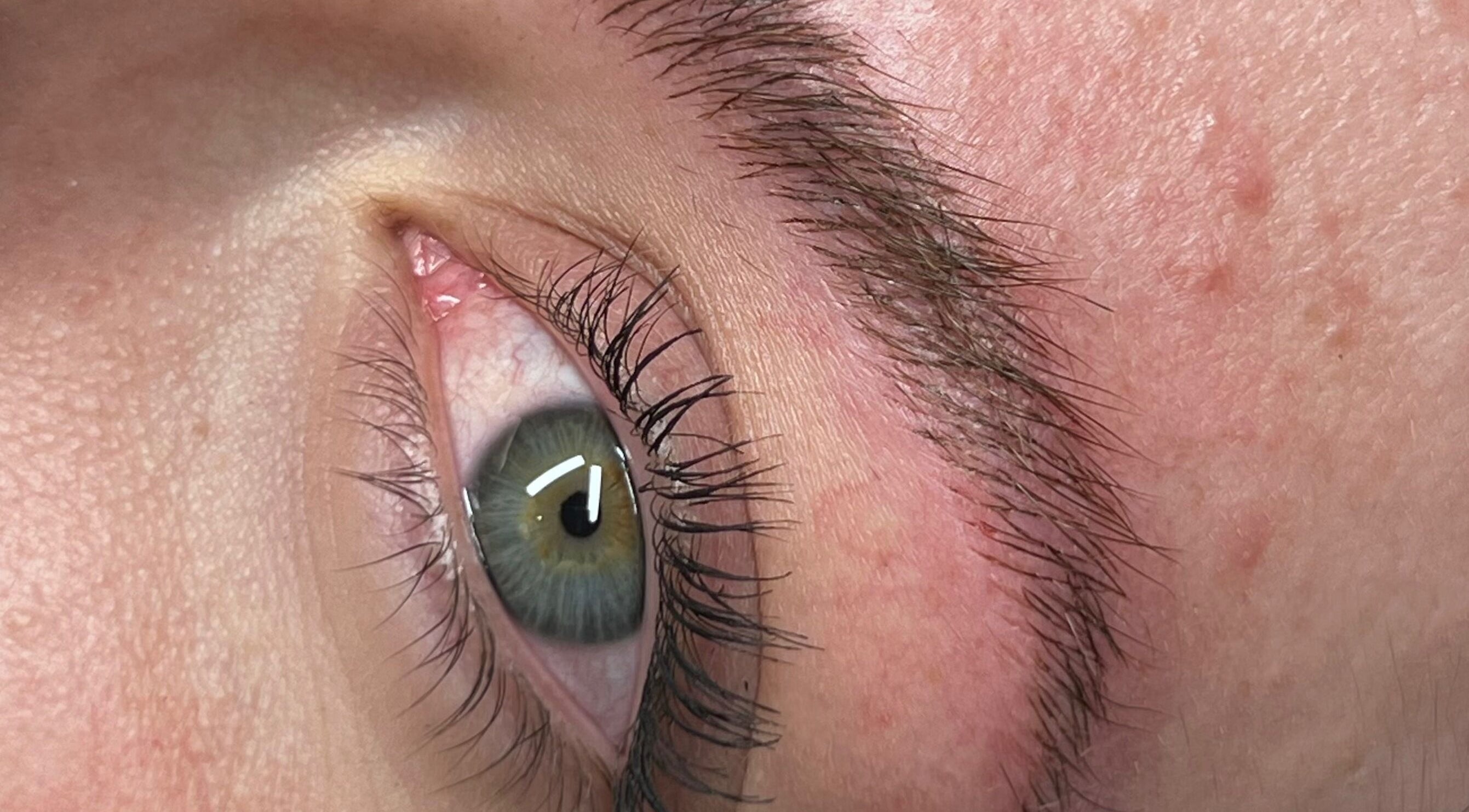 Close-up of expertly shaped eyebrow and eyelashes at Yuna Uchoa, Dublin, County Dublin, IE.