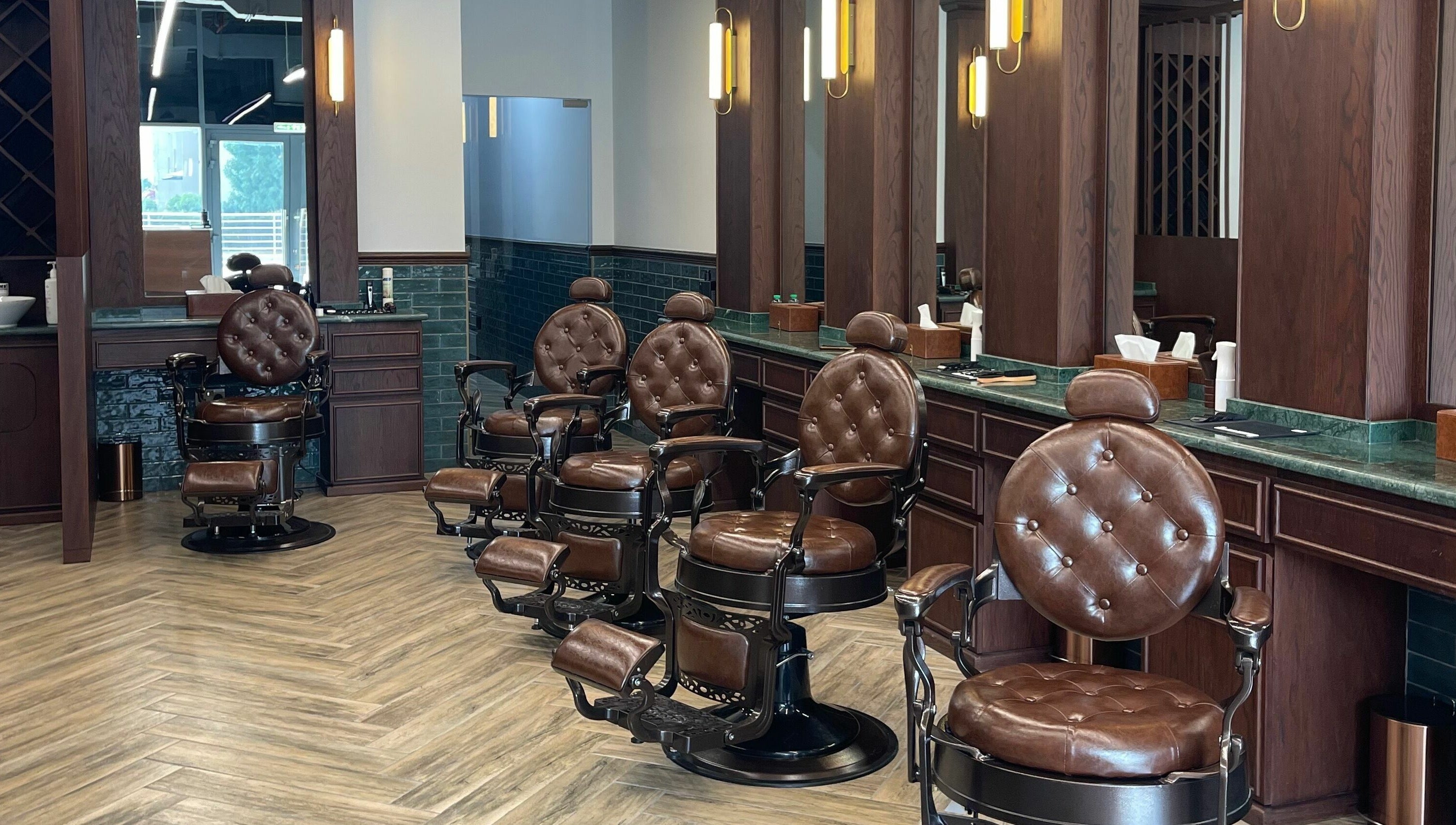 Luxurious barber chairs at The Barber Hub Gents on LLC, Dubai, Dubai, AE offering premium grooming services.