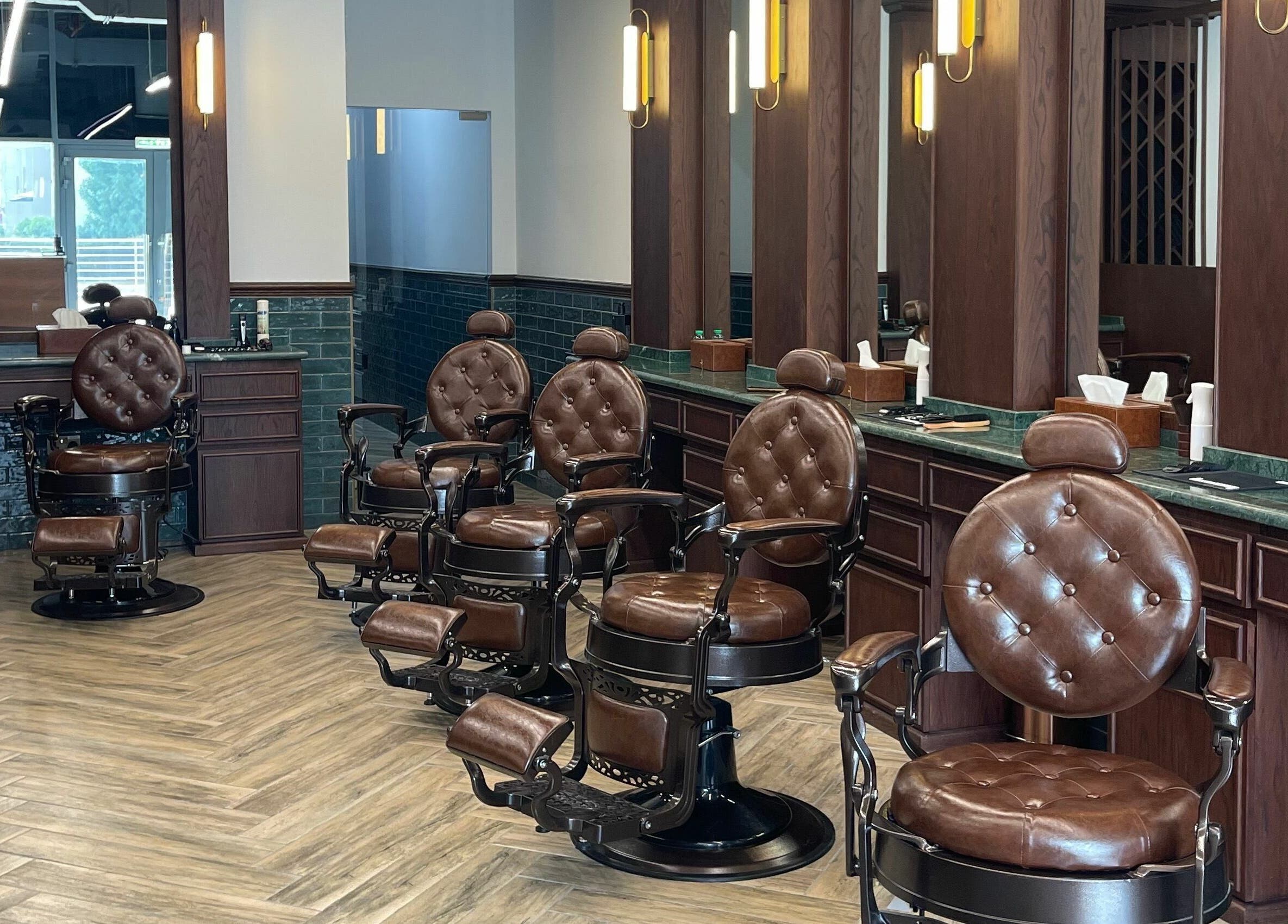 Luxurious barber chairs at The Barber Hub Gents on LLC, Dubai, Dubai, AE offering premium grooming services.