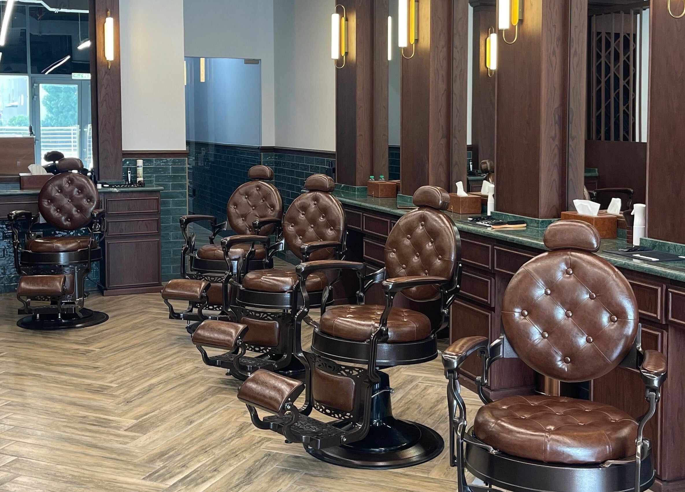 Luxurious barber chairs at The Barber Hub Gents on LLC, Dubai, Dubai, AE offering premium grooming services.