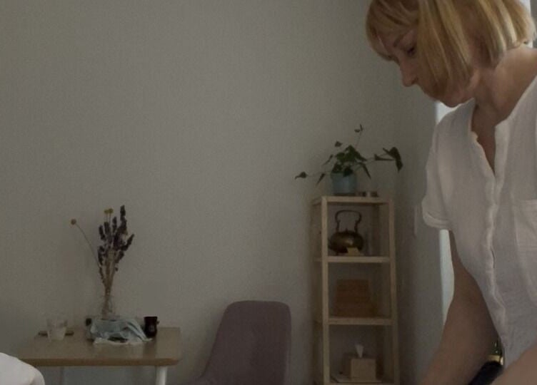 Massage therapist at Ladies Wellness, Amsterdam, Noord-Holland, NL, preparing a relaxation session.