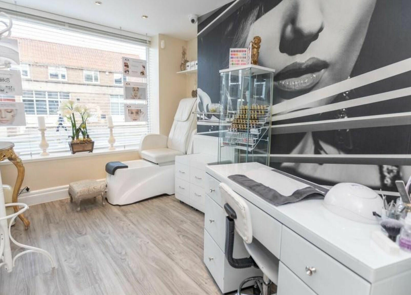 Luxurious beauty room at High Grade House in Acle, England, GB, featuring plush seating and stylish decor.