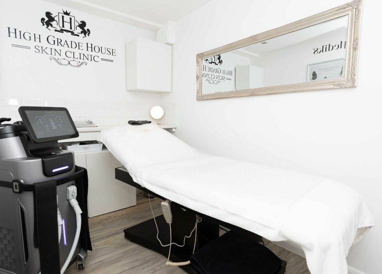 Modern treatment room at High Grade House, Acle, England, GB, featuring advanced skincare machinery.