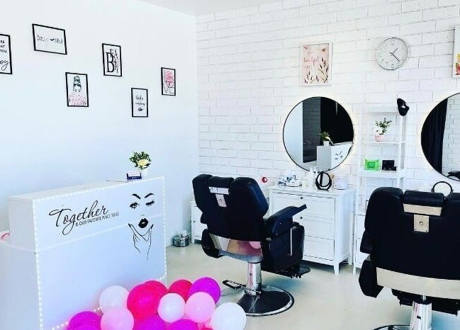 Modern interior of Maddy's Beauty and Brow Bar in Long Jetty, New South Wales, AU with salon chairs and decor.
