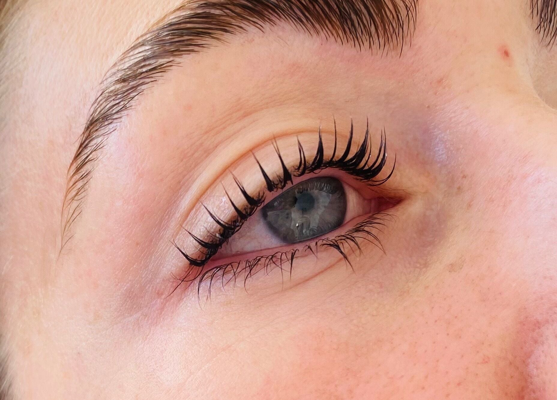 Close-up of perfectly styled eyelashes at Maddy's Beauty and Brow Bar in Long Jetty, New South Wales, AU.