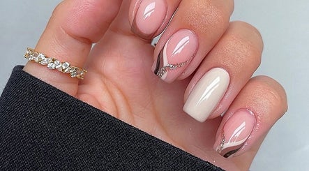 Chic nude nail art with shimmer details at Bespoke Beauty & Skincare, Baildon, England, GB.