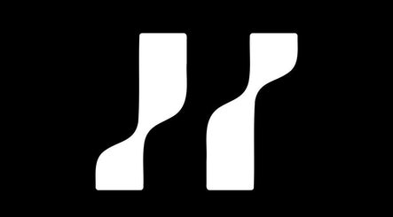 Stylish black and white monogram logo of Huffaz Hairstudio, Kapar, Selangor, MY.