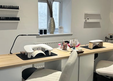 Nail station at Laura Anne Beauty, Douglas, Douglas, IM. Elegant setup with tools and polish display.