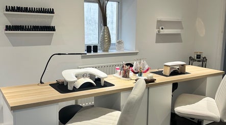 Nail station at Laura Anne Beauty, Douglas, Douglas, IM. Elegant setup with tools and polish display.