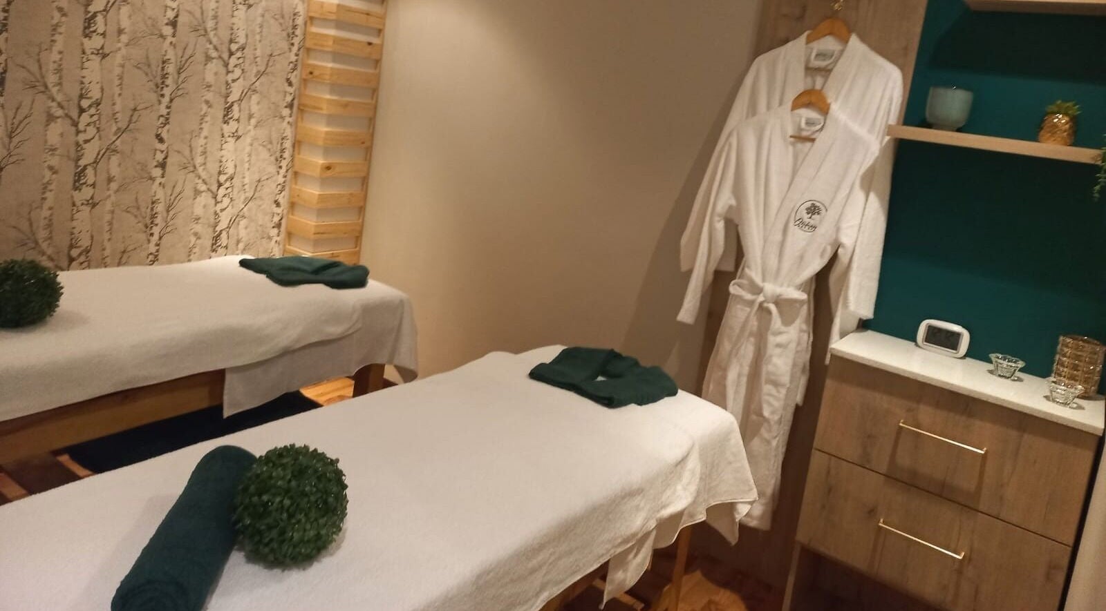 Serene massage room at Orchard Day Spa, Durban, Kwazulu-natal, ZA, featuring dual treatment tables.