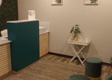 Elegant reception at Orchard Day Spa, Durban, Kwazulu-natal, ZA with stylish decor and seating.